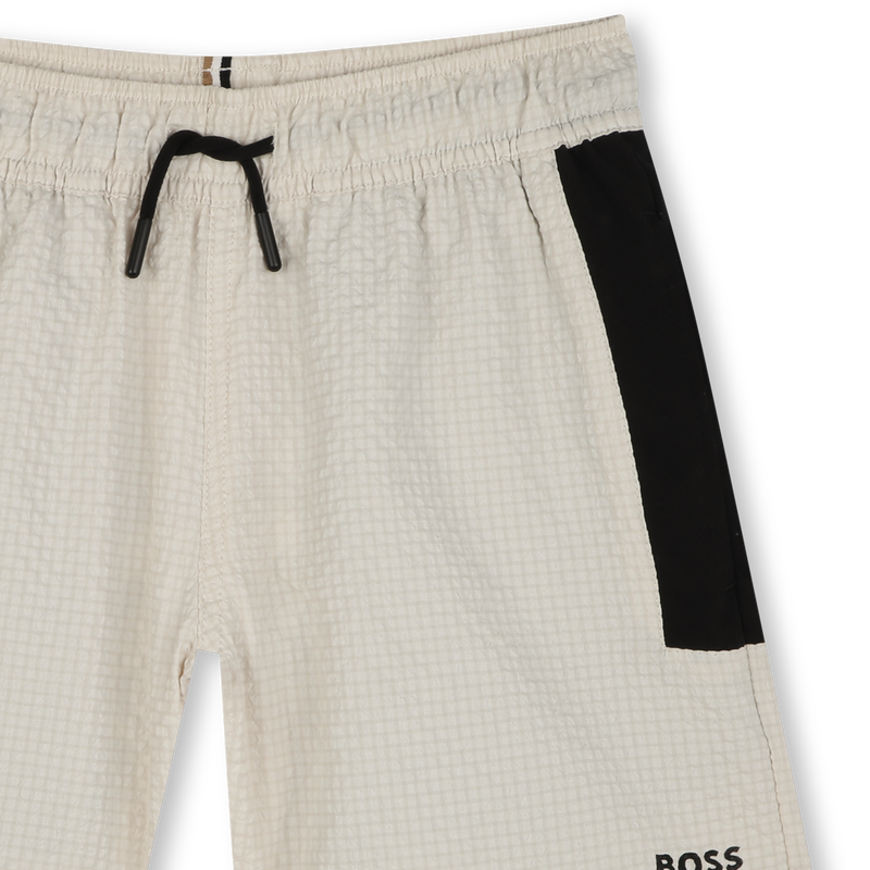 Swimming trunks with trim BOSS 
                    BOY