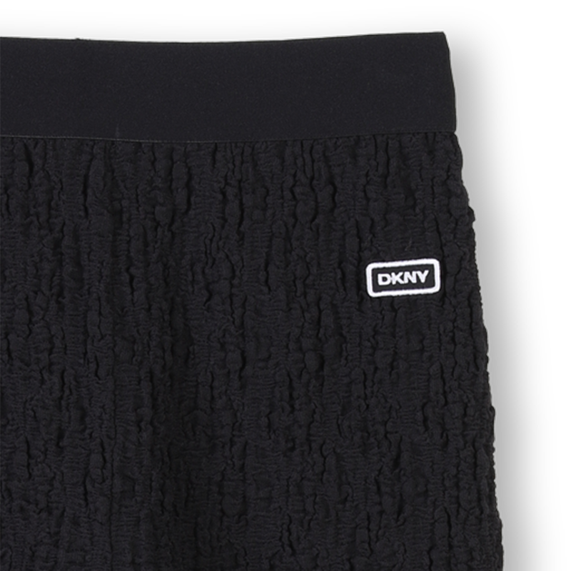 Wide embossed-look trousers DKNY 
                    GIRL